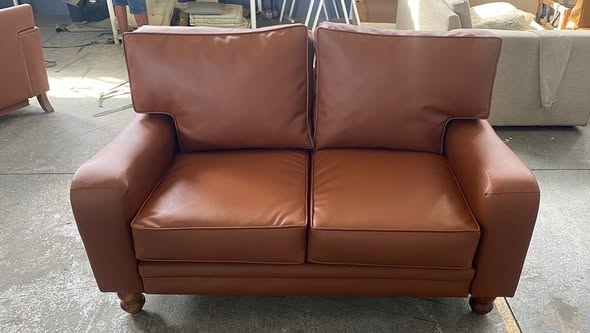 Leather couch reupholstered
